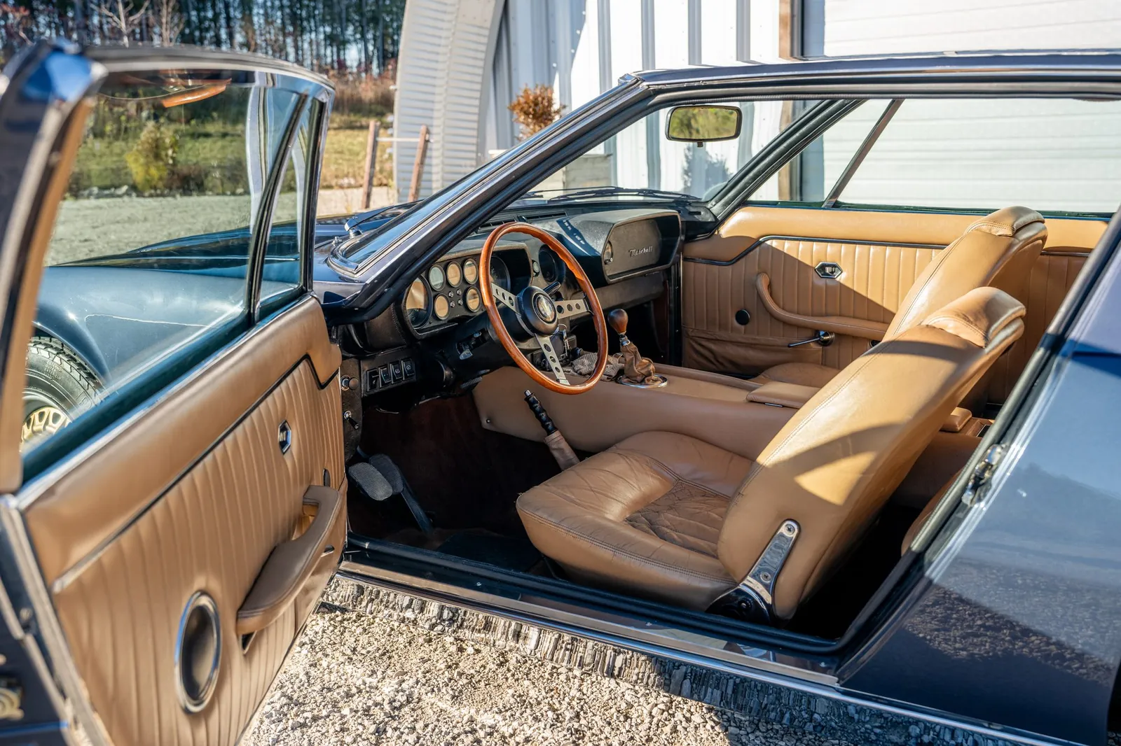 Tan leather interior of a Maserati Indy after conditioning